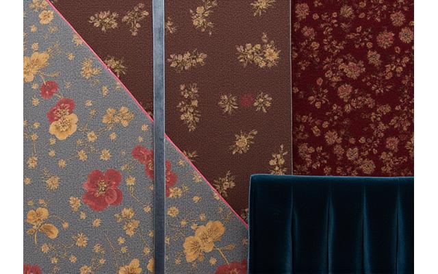 Luxury wallpaper, custom curtains, and fine carpets